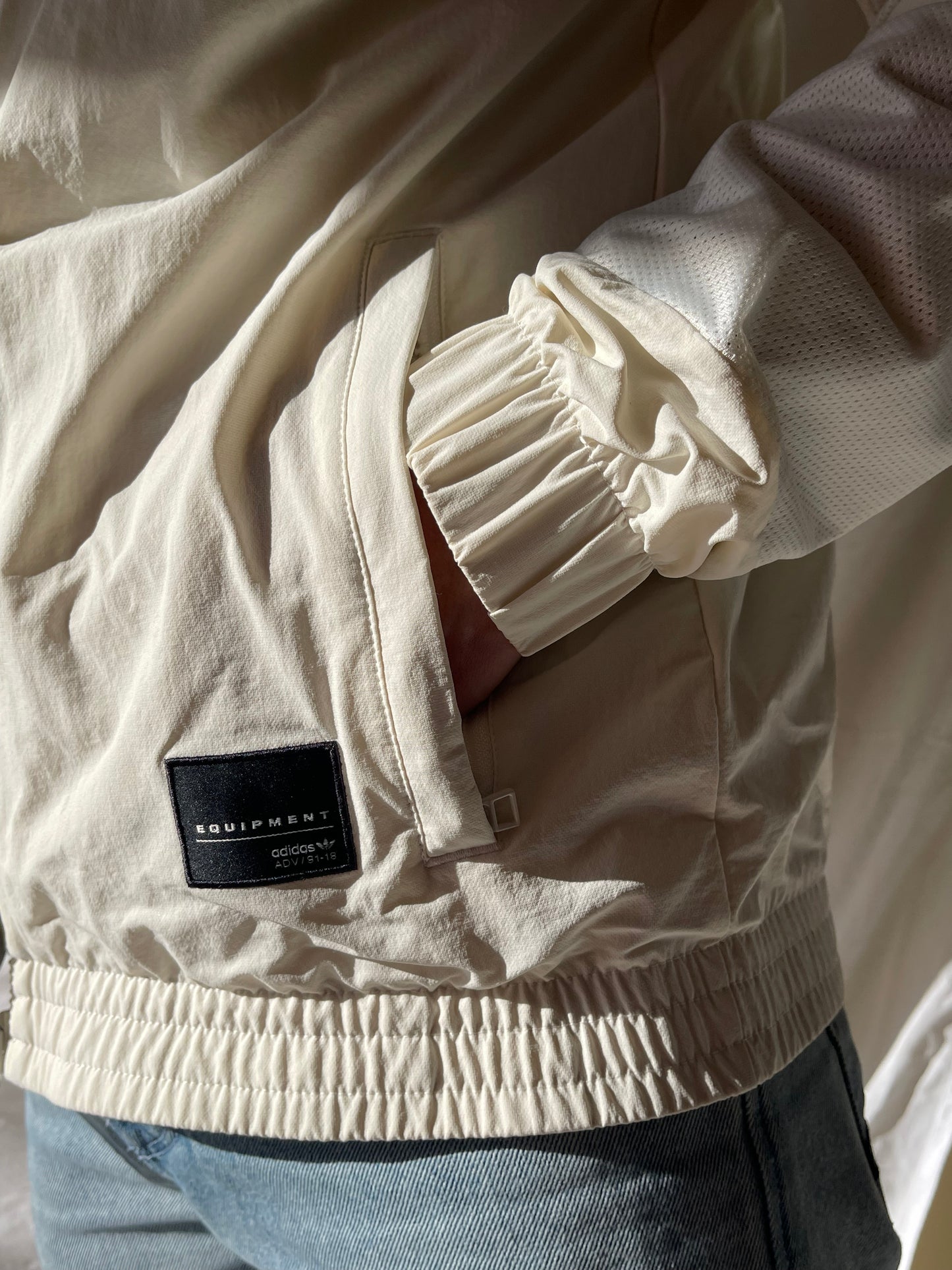 white sports jacket by Adidas