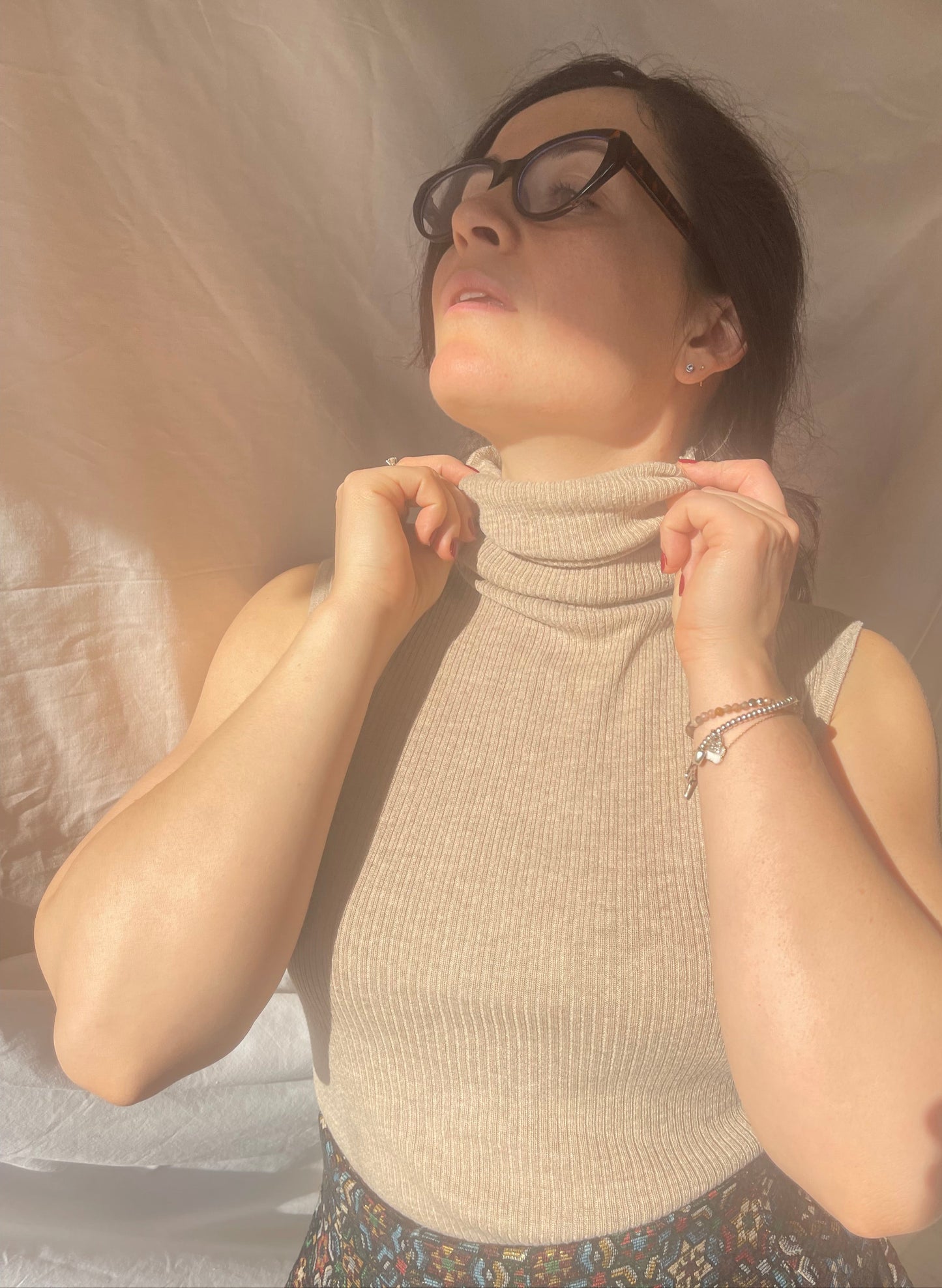 beige sleeveless polo by Mango