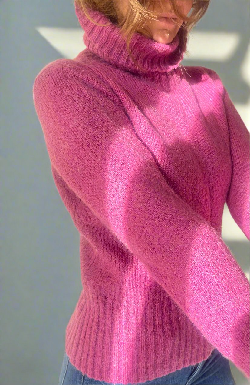 hot pink turtleneck sweater