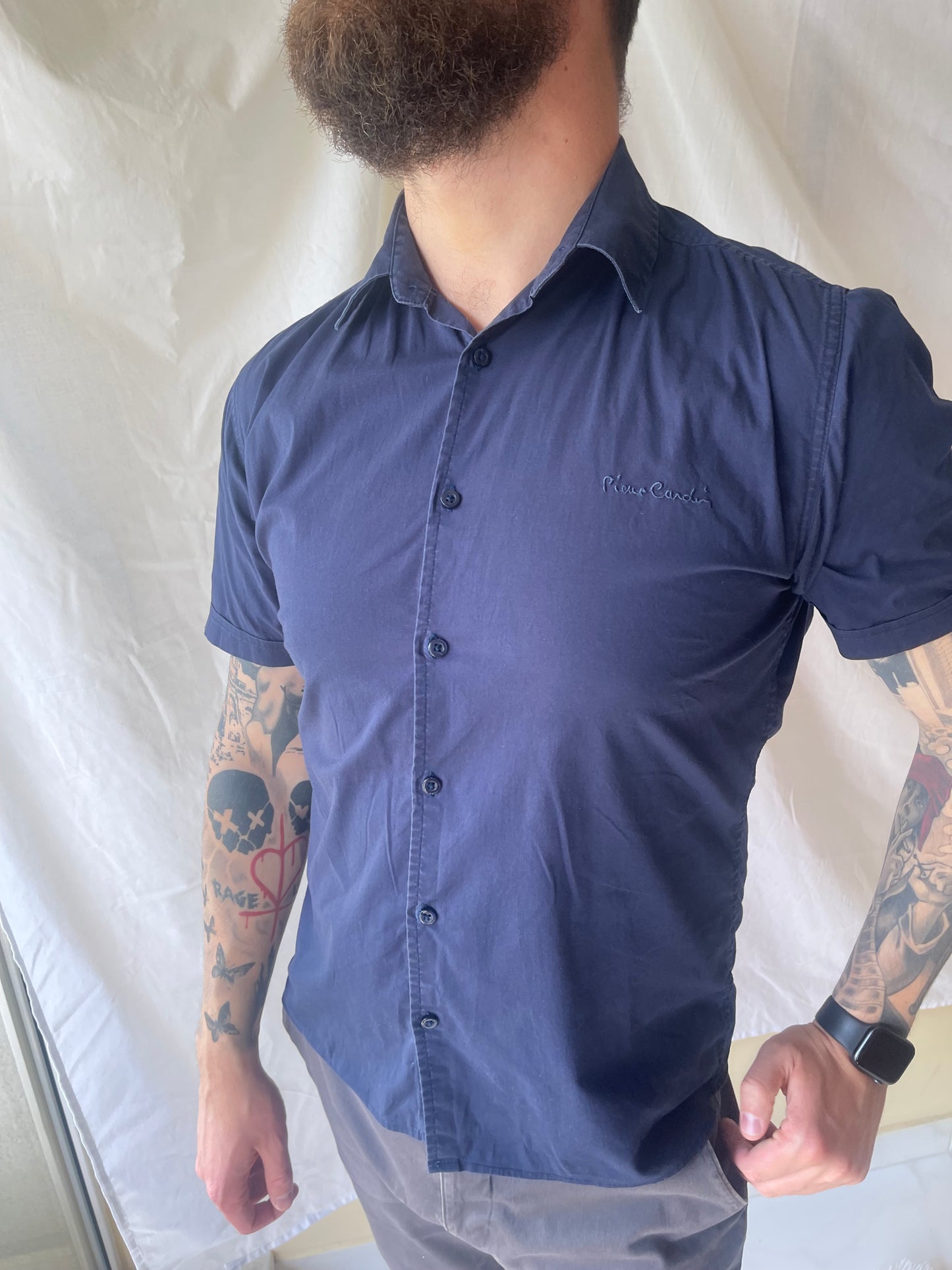 navy blue short-sleeve shirt by Pierre Cardin