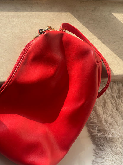 red hot faux-leather handbag