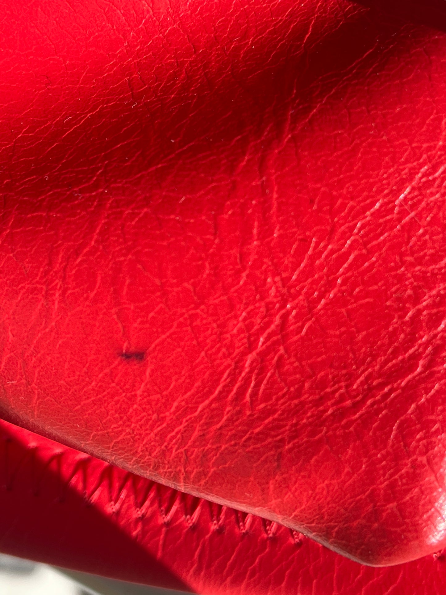 red hot faux-leather handbag